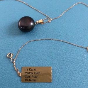 14k gold pear and diamond pendant